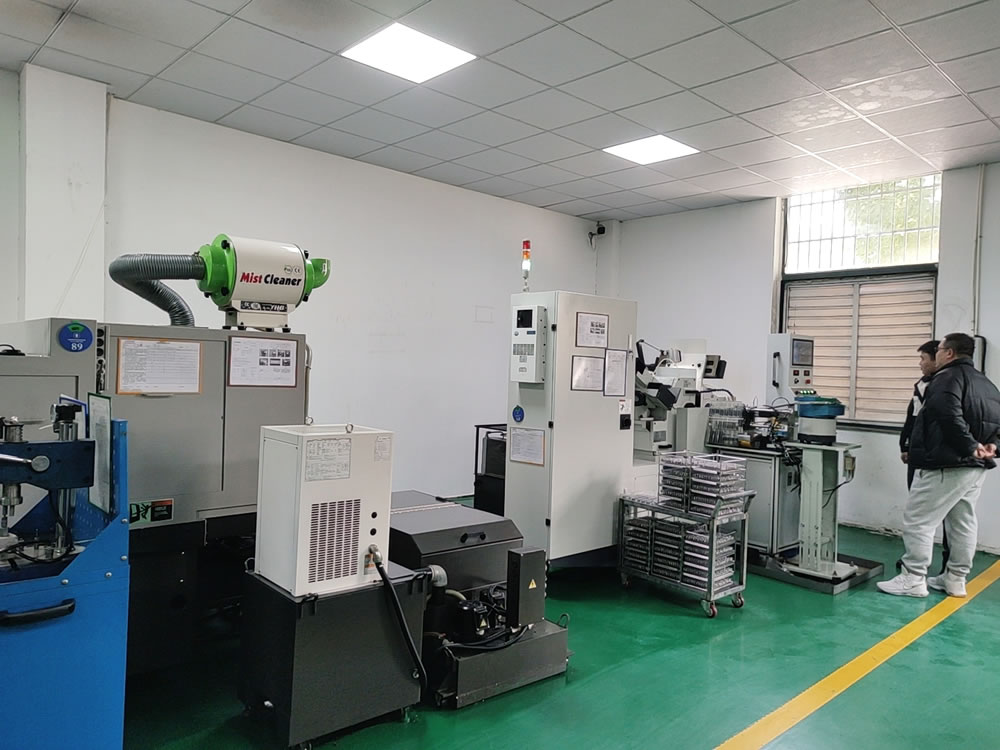 Workers inspecting a machine